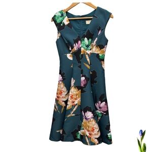 Moulinette Soeurs Teal with a floral pattern from Anthropology size 4